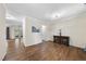 Spacious, light-filled living room featuring hardwood floors and neutral paint at 2904 Britmass Dr, Raleigh, NC 27616