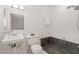 Bathroom features tiled shower, white vanity, toilet, and decorative accents at 3006 Pump Station Ln, Durham, NC 27712