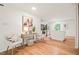 Comfortable sitting area with hardwood floors that flows to the kitchen at 3006 Pump Station Ln, Durham, NC 27712