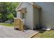Charming home entrance with gravel landscaping and wood porch at 308 Greenwood Dr, Durham, NC 27704
