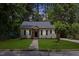 Charming home with a manicured front yard and walkway at 308 Greenwood Dr, Durham, NC 27704