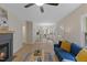 Spacious living room featuring a fireplace, wood floors, and neutral paint at 308 Greenwood Dr, Durham, NC 27704
