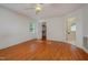 Bedroom with hardwood floors, bright natural light, and an ensuite bathroom at 313 Teresa Dr, Rolesville, NC 27571