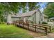 Charming home with a ramp, fenced yard, and fresh landscaping at 313 Teresa Dr, Rolesville, NC 27571