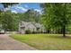 Charming single-story home with a well-manicured lawn and beautiful landscaping at 313 Teresa Dr, Rolesville, NC 27571