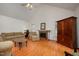 Spacious living room showcasing a fireplace and vaulted ceilings at 313 Teresa Dr, Rolesville, NC 27571