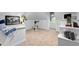 This bonus room features an exercise bike and weights at 317 Chanticlair Dr, Apex, NC 27502
