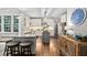 Bright kitchen features a center island, granite countertops, and stainless steel appliances at 317 Chanticlair Dr, Apex, NC 27502