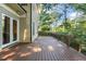 A large deck offers an outdoor extension of the home, perfect for relaxation and enjoying the surrounding nature at 3324 Thomas Rd, Raleigh, NC 27607