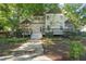 Beautiful home featuring a private deck and professional landscaping at 3324 Thomas Rd, Raleigh, NC 27607