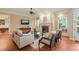 Cozy living room with fireplace, built-in shelves, hardwood floors, and comfortable seating at 3324 Thomas Rd, Raleigh, NC 27607