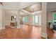 Open-concept living area showcasing hardwood floors and an inviting dining space at 3324 Thomas Rd, Raleigh, NC 27607