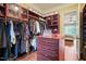 The walk-in closet is organized and spacious, featuring plenty of storage for clothes and accessories at 3324 Thomas Rd, Raleigh, NC 27607