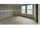 Spacious unfinished bedroom with two large windows, ready for customization and personalization at 37 Chloe Ct, Selma, NC 27576