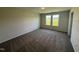 Bright bedroom with neutral carpet, large windows, and plenty of natural light at 37 Chloe Ct, Selma, NC 27576