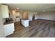 Modern kitchen features granite countertops, white cabinets, stainless steel appliances, and an island at 37 Chloe Ct, Selma, NC 27576