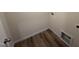 A compact laundry area with hookups and durable luxury vinyl plank flooring at 37 Chloe Ct, Selma, NC 27576