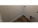 Clean laundry room area with hookups and neutral walls, ready for appliances at 37 Chloe Ct, Selma, NC 27576