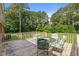 A relaxing back deck features comfortable seating, perfect for enjoying the outdoors at 445 Lee County Line Rd, Broadway, NC 27505