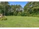 Lush green backyard providing a private and serene outdoor space at 445 Lee County Line Rd, Broadway, NC 27505