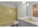 Bathroom featuring a tiled shower and bathtub, as well as a large mirror at 445 Lee County Line Rd, Broadway, NC 27505