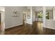 Bright living area features hardwood floors, neutral paint, and plenty of natural light throughout at 4619 Regency Dr, Durham, NC 27713