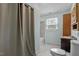 This bathroom features tile floors, a shower-tub combo with tile surround, and a single-sink vanity at 4709 Tyne Dr, Durham, NC 27703