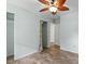 This bedroom has hardwood floors, closet, and entrance into the hallway at 4709 Tyne Dr, Durham, NC 27703