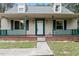 Charming home featuring a cozy front porch and dormer windows at 4709 Tyne Dr, Durham, NC 27703