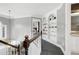 Hallway with built-in shelving and access to a bedroom and bathroom at 5013 Wheatridge Dr, Fuquay Varina, NC 27526