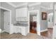 Home office featuring built-in cabinets and desk area with granite countertops at 5013 Wheatridge Dr, Fuquay Varina, NC 27526