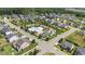 An aerial view of the community pool surrounded by homes, trees, and manicured lawns at 509 Holden Forest Dr, Youngsville, NC 27596