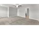 Spacious bedroom offers plush carpet, ceiling fan, and attached bath at 509 Holden Forest Dr, Youngsville, NC 27596