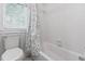 Traditional bathroom with a bathtub and shower combination at 5109 Windance Pl, Holly Springs, NC 27540