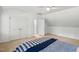 Bedroom featuring neutral carpeting, ceiling fan, and closet in a home at 5109 Windance Pl, Holly Springs, NC 27540