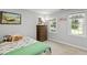 Cozy bedroom with natural light and views of the outside at 5109 Windance Pl, Holly Springs, NC 27540