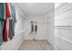 Large walk-in closet with wire shelving for ample storage at 5109 Windance Pl, Holly Springs, NC 27540