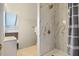 Stylish bathroom featuring a marble-tiled shower and modern fixtures at 5205 Coffeetree Dr, Raleigh, NC 27613