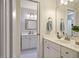 Modern bathroom with a large single vanity, white shaker cabinets, and chrome fixtures at 5205 Coffeetree Dr, Raleigh, NC 27613