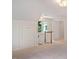 Upstairs hallway features a linen closet and a carpeted floor leading to an adjacent bedroom at 5205 Coffeetree Dr, Raleigh, NC 27613