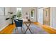 Bright office area featuring hardwood floors, fresh neutral paint, and updated lighting at 5205 Coffeetree Dr, Raleigh, NC 27613