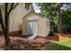 Exterior view of a shed on a well maintained lawn at 5205 Coffeetree Dr, Raleigh, NC 27613