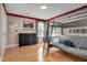 bedroom featuring a bunk bed with futon, hardwood flooring, and decorative accents at 5637 Garnet Meadow Rd, Knightdale, NC 27545