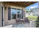 Relaxing porch with comfortable seating, a decorative rug, and views of the neighborhood at 5637 Garnet Meadow Rd, Knightdale, NC 27545