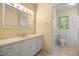 Bathroom featuring a vanity and toilet at 658 Hiawatha Pl, Burlington, NC 27217