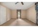 Neutral bedroom with fan, carpet, and window with patterned valance at 658 Hiawatha Pl, Burlington, NC 27217