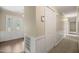 Foyer featuring a decorative front door and neutral wall colors, connecting to hallway and closet spaces at 658 Hiawatha Pl, Burlington, NC 27217