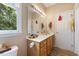 Bathroom with vanity, bright lighting, and storage at 800 Savannah Ridge Rd # 109, Holly Springs, NC 27540