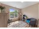 Brightly lit bedroom with a large window and minimal decor at 800 Savannah Ridge Rd # 109, Holly Springs, NC 27540