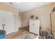 Spacious bedroom with a wardrobe and a glass side table at 800 Savannah Ridge Rd # 109, Holly Springs, NC 27540